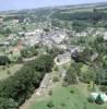 Photos aériennes de "verdure" - Photo réf. 17352 - Vue d'ensemble d'une commune au coeur de la verdure.