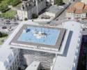Photos aériennes de "hélistation" - Photo réf. 1832_24 - L'EC 135 du SAMU sur le toit du centre de neurologie. Cette hélistation en terrasse est une des rares existantes en France.