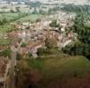 Photos aériennes de "colline" - Photo réf. 20392 - Aux abords du bourg, en descendant vers la rivire, le village apparat tag sur sa colline, prsentant au premier plan, son vieux pont de pierre qui enjambe l'Armanon.