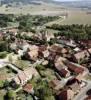 Photos aériennes de "colline" - Photo réf. 20398 - Aux abords du bourg, en descendant vers la rivire, le village apparat tag sur sa colline, prsentant au premier plan, son vieux pont de pierre qui enjambe l'Armanon.