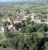 Photos aériennes de "AVEC" - Photo réf. 22331 - Eglise romane du 11me sicle en pierre dore, classe, avec un clocher-tour octogonal et prieur bndictin du 10me sicle avec donjon carr.