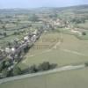 Photos aériennes de "Vallée" - Photo réf. 23073 - Vue d'ensemble du village situé dans la vallée de la Guye.