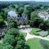 Photos aériennes de "foret" - Photo réf. 8956 - Un village connu pour son château du XVIè siècle et ses 1200 ha de forêt.