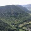 Photos aériennes de "dominé" - Photo réf. N001637 - Le chef-lieu de la Lozère dominé par le massif montagneux