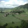  - Photo réf. 30084 - Le Mont Poupet, le plus haut sommet de la rgion, domine le village.