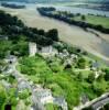 Photos aériennes de "chateau-fort" - Photo réf. 34459 - La tour crénelée d'un château fort datant du XVè et la petite église de Trèves.