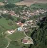 Photos aériennes de "patrimoine" - Photo réf. 37391 - Au cur du Val d'Arbois, dans un site agrable, le patrimoine du village compte une glise du XIIe sicle remanie au XIXe sicle, un chteau priv du XIXe sicle, et une tour du Gnral Delort.