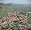 Photos aériennes de "ville" - Photo réf. 37511 - La ville de Kaysersberg niche dans la valle de la Weiss, cerne par les vignes et la fort.