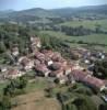 Photos aériennes de "village" - Photo réf. 38236 - Aux frontires du dpartement de l'Ain, le village symbolise la lutte opinitre de la Petite Montagne pour la survie d'un canton rural et d'un certain art de vivre.