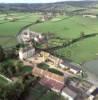 Photos aériennes de "romane" - Photo réf. 44058 - On aperçoit le château, remanié au XVIIIe siècle, et l'église romane du XIIe siècle.
