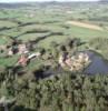 Photos aériennes de "Terre" - Photo réf. 44288 - Le château, des XIIIè et XVIIIè siècles, était la propriété du seigneur Bertrand de Priézac. Construite au bord d'un étang, sur une avancée de terre, la demeure était protégée par des douves et un pont-levis.
