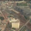 Photos aériennes de "(nord)" - Photo réf. 58848 - Il s'agit de l'ancienne gare du Nord de Paris apporte pierre par pierre, dont la construction en kit a commenc en 1866. A ct de celle-ci, se dresse le centre d'affaires Euralille.