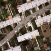 Photos aériennes de "Quartier" - Photo réf. 62090 - Un quartier résidentiel et ses jardins à l'arrière des maisons.