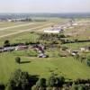 Photos aériennes de "aérodrome" - Photo réf. 62496 - En arrire plan nous distinguons les pistes et la tour de contrle.