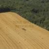 Photos aériennes de "foret" - Photo réf. N000760 - A l'orée de la forêt, le ramassage de la paille.