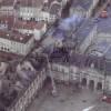 Photos aériennes de "pompier" - Photo réf. N004997 - La toiture encore fumante du château de Lunéville (Meurthe-et-Moselle) après l'incendie survenu le 02 janvier 2003.