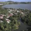 Photos aériennes de La Trinité (97220) - Le Quartier Bac | Martinique, Martinique, France - Photo réf. N005155 - Un îlot d'habitations en bordure de l'océan.