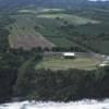 Photos aériennes de Ducos (97224) - Les Alentours | Martinique, Martinique, France - Photo réf. N005960 - Paysage insolite o le stade semble pos au milieu de nulle part, entre mer et terre.