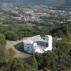 Photos aériennes de "forme" - Photo réf. N017812 - Construite en 1955 par Le Corbusier, la chapelle de Ronchamp ou la chapelle Notre-Dame du Haut attire de nombreux visiteurs avec sa forme atypique.