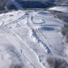 Photos aériennes de "Station" - Photo réf. N020541 - Vue sur les pistes de le station de sport d'hiver de La Bresse dans les Vosges.