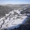 Photos aériennes - Paysages de montagne - Photo réf. N020570 - Le village de Rochesson dans les Vosges sous la neige.