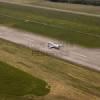 Photos aériennes de "aérodrome" - Photo réf. N029404 - Un Embraer ERJ-145 au dcollage piste 13  l'aroport de Pau-Pyrnes.