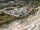 Photos aériennes de "cimenterie" - Photo réf. T034750 - Une imposante cimenterie à Saint-Pierre-la-Cour (Mayenne).