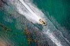 Photos aériennes de "lac*" - Photo réf. C088738 - Un Jet Ski lanc  toute vitesse sur un lac en Gironde.