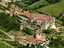 Photos aériennes de "siècle," - Photo réf. T040844 - Ce château féodal du 12ème siècle à Berzé-le-Châtel (Saône-et-Loire) défendait autrefois le passage entre Cluny et Mâcon et possédait 13 tours.