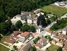 Photos aériennes de Lugny (71260) | Saône-et-Loire, Bourgogne, France - Photo réf. T041746 - Derrère l'église Saint-Denis on peut voir les deux tours restantes d'un ancien château-fort du Moyen-Age.