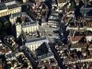 Photos aériennes de "dominé" - Photo réf. T049751 - La place de la Libération et la mairie installée dans le Palais des Ducs de Bourgogne. La tour Philippe Le Bon domine la ville.