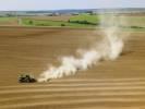 Photos aériennes de "tracteur" - Photo réf. T082313 - Un tracteur dans un champs en Bourgogne.