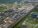 Photos aériennes de "usine" - Photo réf. T070283 - Il s'agit de l'usine Saint-Gobain où sont fabriquées les très répandues plaques d'égout en fonte marquées PAM pour Pont-à-Mousson..