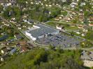 Photos aériennes de "centre" - Photo réf. T073675 - Le centre commercial Super U de Baume-les-Dames dans le Doubs.