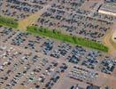 Photos aériennes de "automobile" - Photo réf. T100676 - Un parking automobile rempli de voitures neuves.