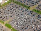 Photos aériennes de "parking" - Photo réf. T100677 - Un parking automobile rempli de voitures neuves.