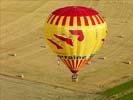 Photos aériennes de "ballon" - Photo réf. U092159 - Une montgolfire lors du Lorraine Mondial Air Ballons 2009 sur la base de Chambley-Bussires, Meurthe-et-Moselle.