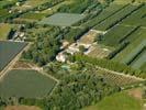 Photos aériennes de "bocage" - Photo réf. U099948 - Les vergers et autres cultures sont entours de hautes haies brise-vent, rappelant le bocage normand.