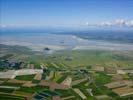 Photos aériennes de "unesco" - Photo réf. U110005 - Vue du clbre Mont-Saint-Michel et de sa baie, et de l'lot Tombelaine, classs au Patrimoine Mondial de l'UNESCO.