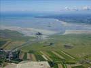 Photos aériennes de "mont" - Photo réf. U110007 - Vue du clbre Mont-Saint-Michel et de sa baie, et de l'lot Tombelaine, classs au Patrimoine Mondial de l'UNESCO.