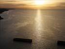 Photos aériennes de "coucher" - Photo réf. U111141 - Sur le littoral d'Arromanches-les-Bains ces caissons Phoenix, au nombre de 146, taient destins  la formation des jetes-abris devant les ports Mulberries A et B.