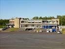 Photos aériennes de "aérodrome" - Photo réf. U124297 - L'Arogare de Dinard-Pleurtuit-Saint Malo vue depuis les parkings avion.