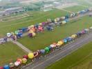 Photos aériennes - Mondial Air Ballons 2011 - Photo réf. U112023 - Record Mondial de décollage en ligne : 343 montgolfières le Mercredi 27 Juillet 2011.