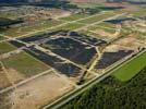 Photos aériennes de "ecologie" - Photo réf. U113127 - Le chantier d'installation de la plus puissante centrale photovoltaique du monde sur l'ancienne base aérienne 136 de Toul-Rosières par EDF Energies Nouvelles au 29 Août 2011.
