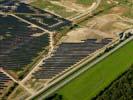 Photos aériennes de "renouvelables" - Photo réf. U113129 - Le chantier d'installation de la plus puissante centrale photovoltaique du monde sur l'ancienne base aérienne 136 de Toul-Rosières par EDF Energies Nouvelles au 29 Août 2011.