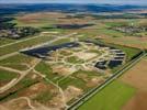 Photos aériennes de "toul" - Photo réf. U113133 - Le chantier d'installation de la plus puissante centrale photovoltaique du monde sur l'ancienne base aérienne 136 de Toul-Rosières par EDF Energies Nouvelles au 29 Août 2011.