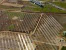 Photos aériennes de "solaire" - Photo réf. U113138 - Le chantier d'installation de la plus puissante centrale photovoltaique du monde sur l'ancienne base aérienne 136 de Toul-Rosières par EDF Energies Nouvelles au 29 Août 2011.