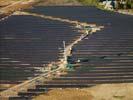 Photos aériennes de "électricité" - Photo réf. U115347 - Le chantier d'installation de la plus puissante centrale photovoltaique du monde sur l'ancienne base aérienne 136 de Toul-Rosières par EDF Energies Nouvelles au 28 Septembre 2011.