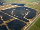 Photos aériennes de "puissante" - Photo réf. U115358 - Le chantier d'installation de la plus puissante centrale photovoltaique du monde sur l'ancienne base aérienne 136 de Toul-Rosières par EDF Energies Nouvelles au 16 Janvier 2012.
