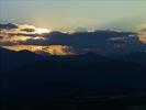Photos aériennes de Ghisonaccia (20240) | Haute-Corse, Corse, France - Photo réf. E127221 - Coucher de soleil sur la montagne avant d'atterir à Ghisonaccia, le Monte d'Oro en arrirère-plan qui culmine à 2389m d'altitude (5ème sommet Corse)